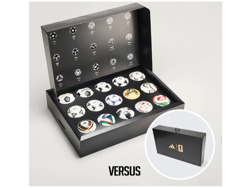 Box of 15 balls sit in Adidas black box. 