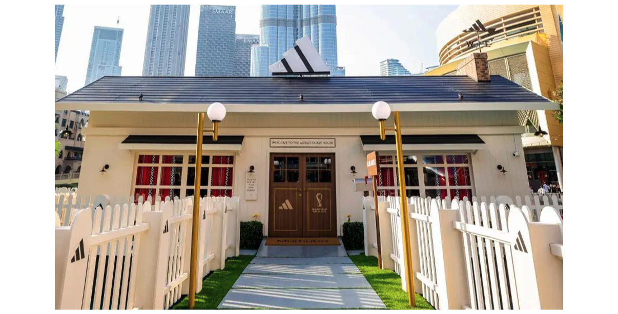 Adidas’s activation appears like a 70s style home with a fenced garden. 