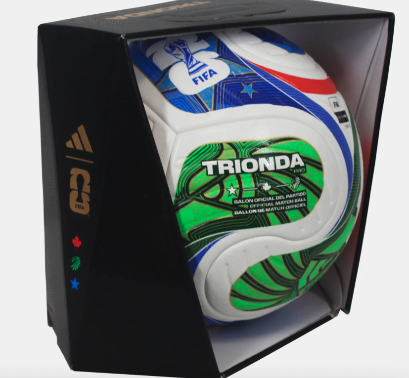 Exclusive game ball sits in a sleek box with tournament branding. 