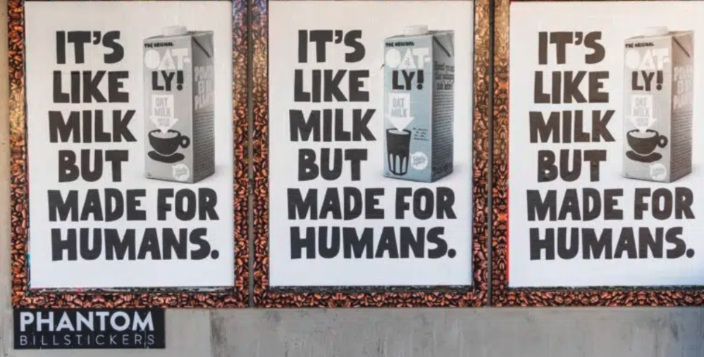 Posters show an oatly carton alongside the slogan: “It’s like milk, but made for humans.”  
