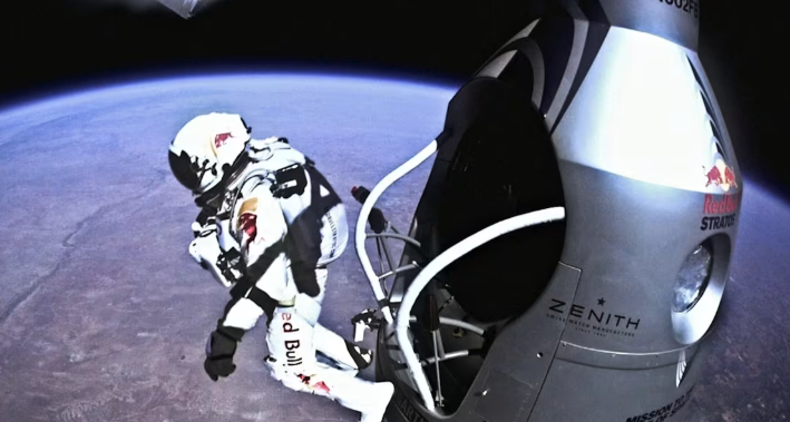 Photo of Felix Baumgartner’s Stratos jump in a spacesuit with Red Bull sponsorship above Earth