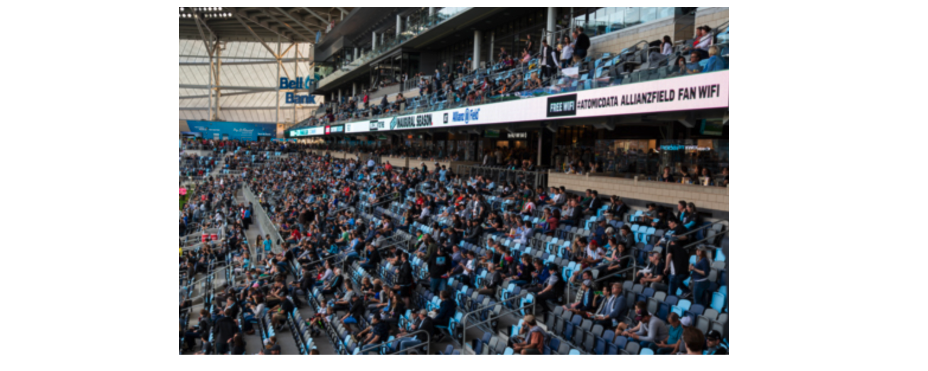 Ribbon displays are placed above and below fan seats in a stadium