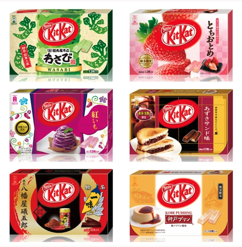 six boxes, labeled “Nestle KitKat” in different colors with different flavors. All have some Japanese characters