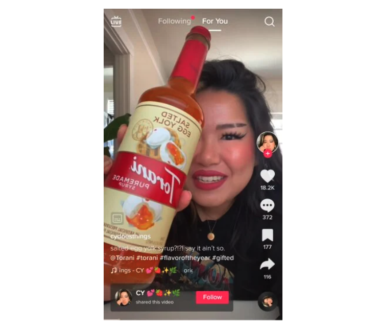 TikTok product promo still of user promoting salted egg yolk syrup