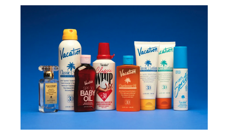 Image of Vacation brand line of SPF products on a blue background