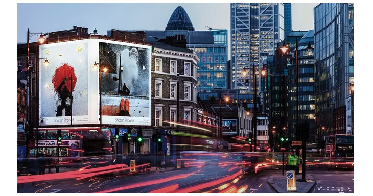 billboard image of Apple’s first Shot on Phone campaign ad for iPhone 6 on billboard in London