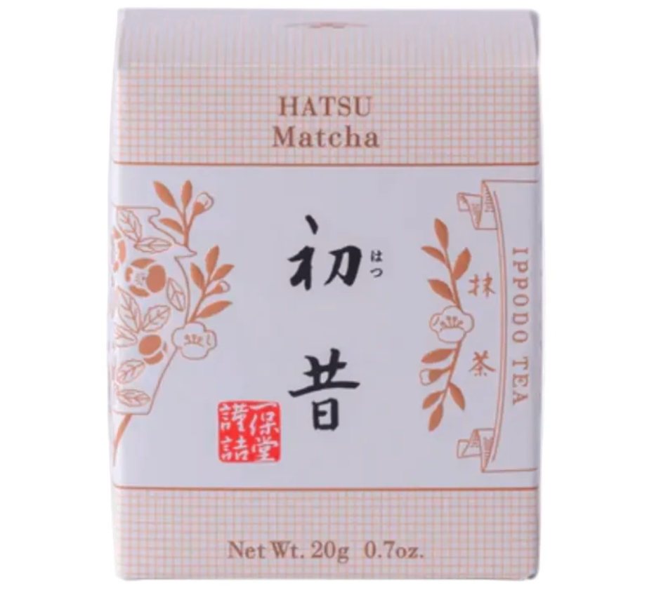 Package of matcha tea with Japanese typography and drawings. 